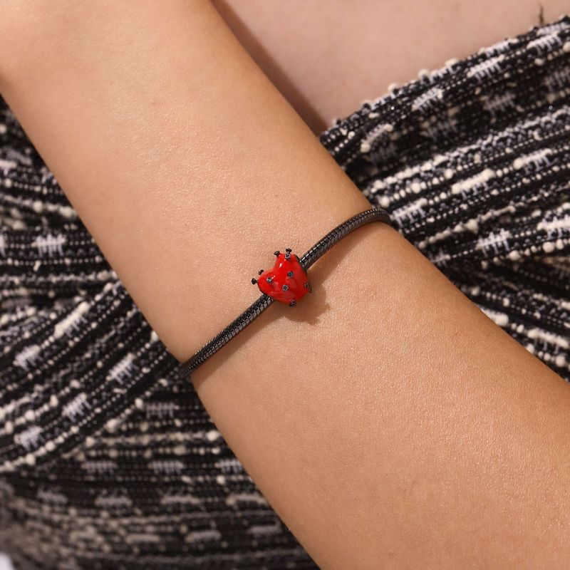 Mechanical Nails Inserted into Love Charm