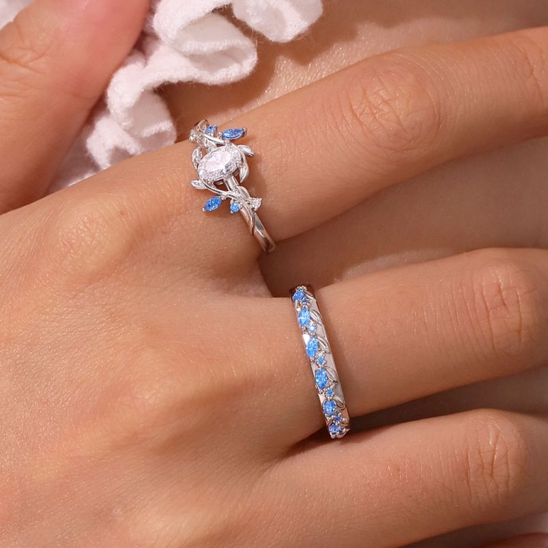 Oval-cut Diamond Vine Leaf Couple Rings