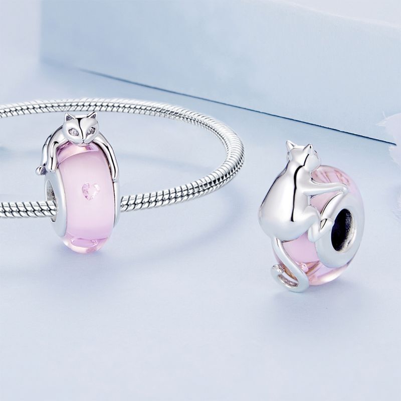 Cat Lying on Pink Glass Charm