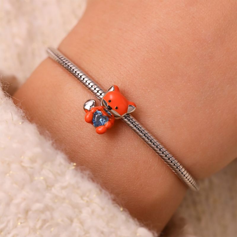 Smudge Fox Embraces Love Charm