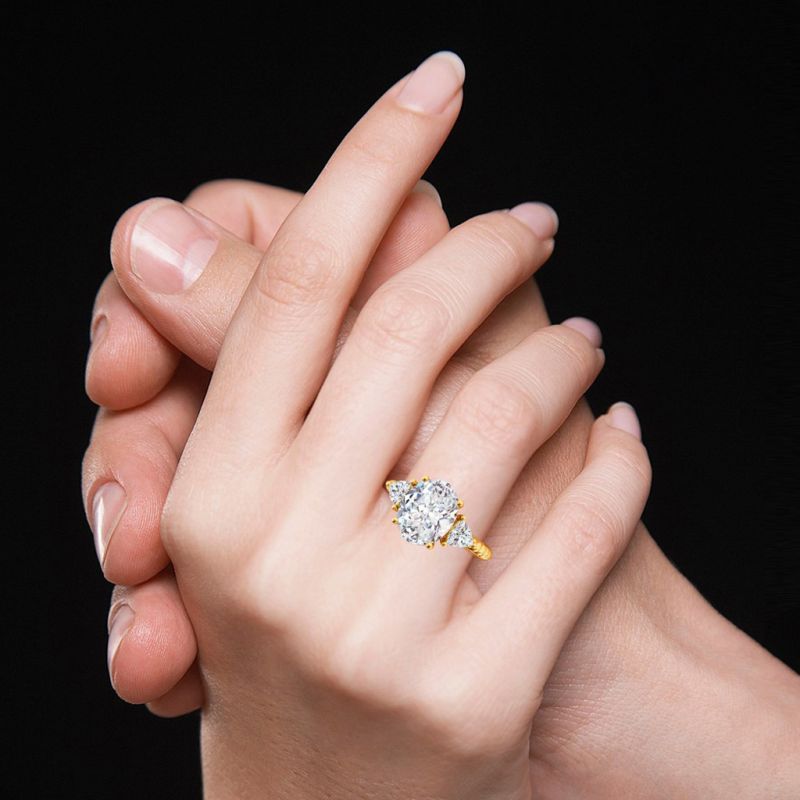 Oval Three-stone Engagement Ring