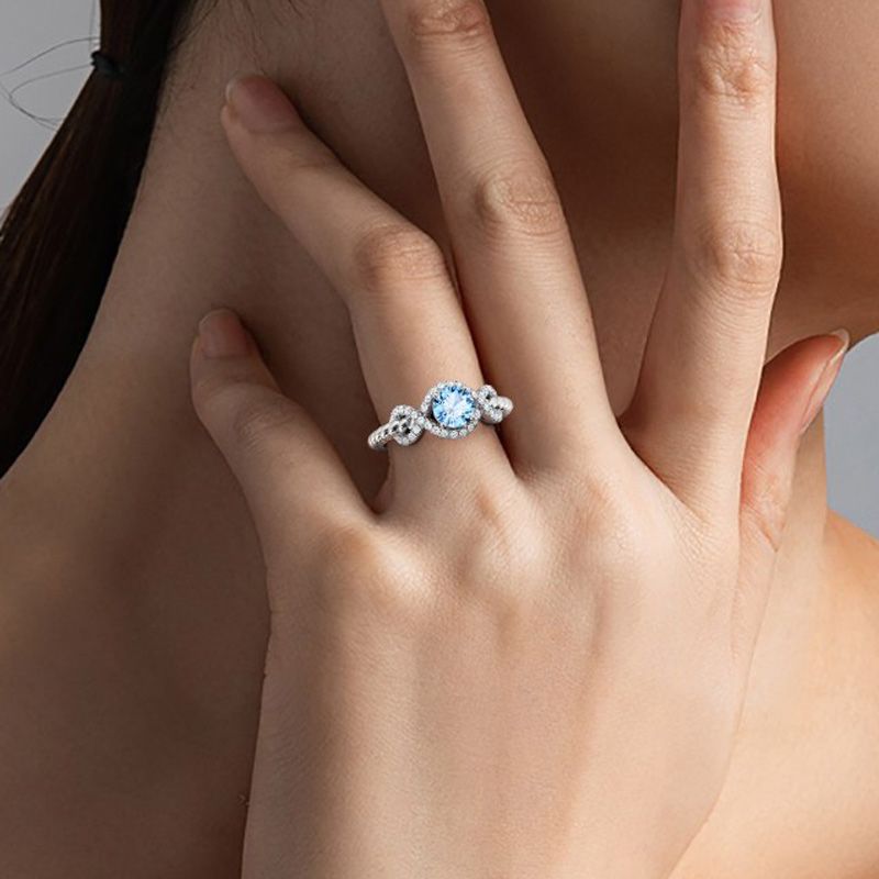 Round Cut Twist Infinity Ring