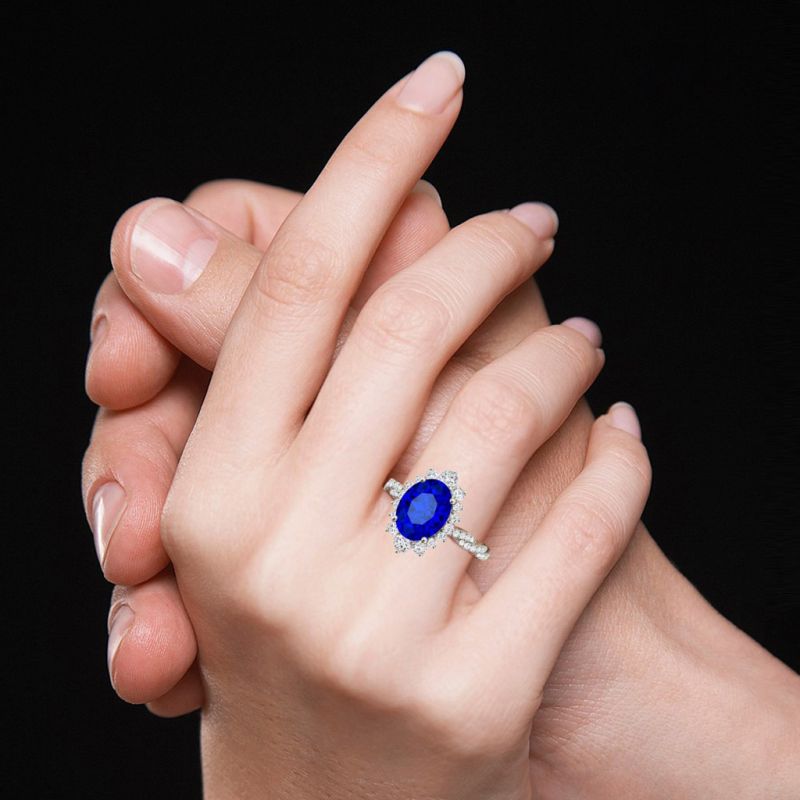 Sapphire Cluster Halo Twisted Ring