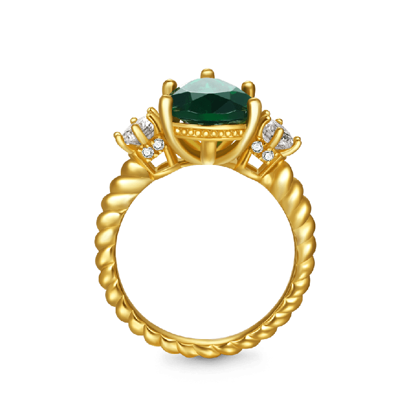 Pear-cut Emerald Three-stone Ring