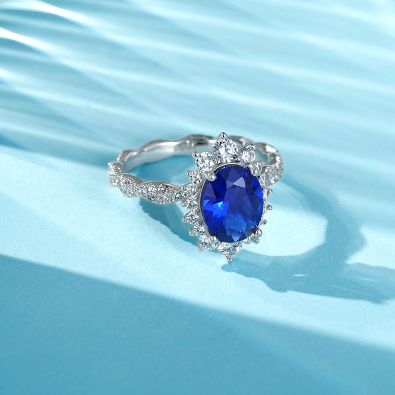 Sapphire Cluster Halo Twisted Ring